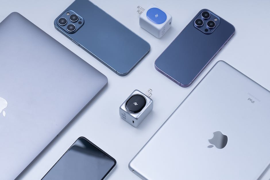 A visual representation of various Apple TV devices with the Apple logo displayed alongside the text 'Apple TV Tips and Tricks' for visually impaired individuals.
